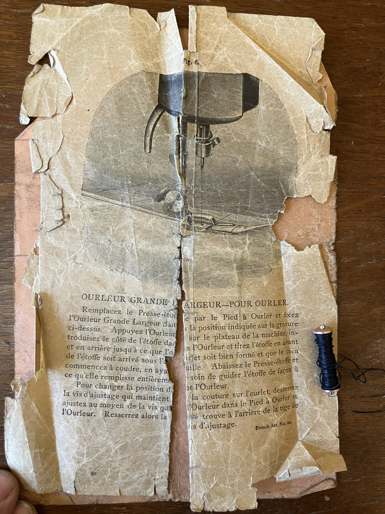 Page showing a spool of thread